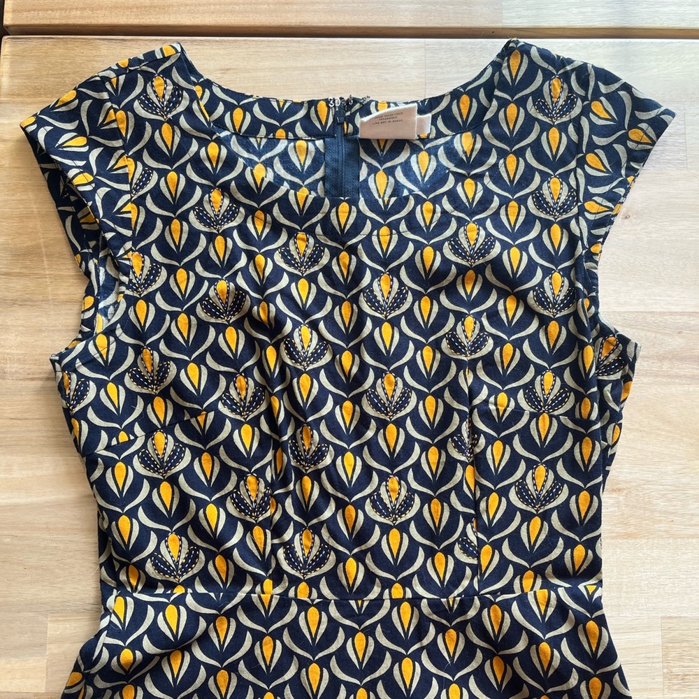 Sweet summer cotton dress with embroidery detail.